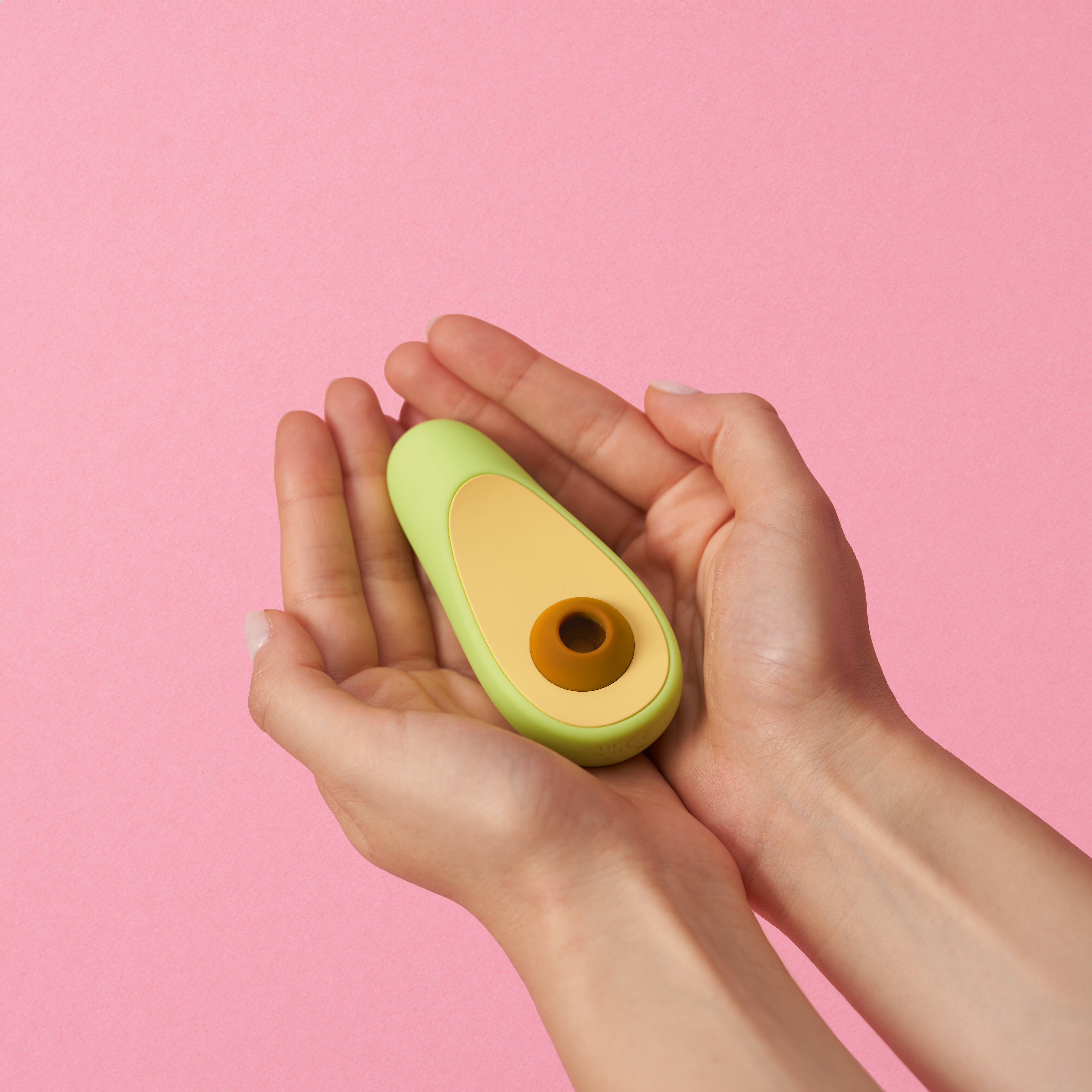Avocado vibrator — in hand