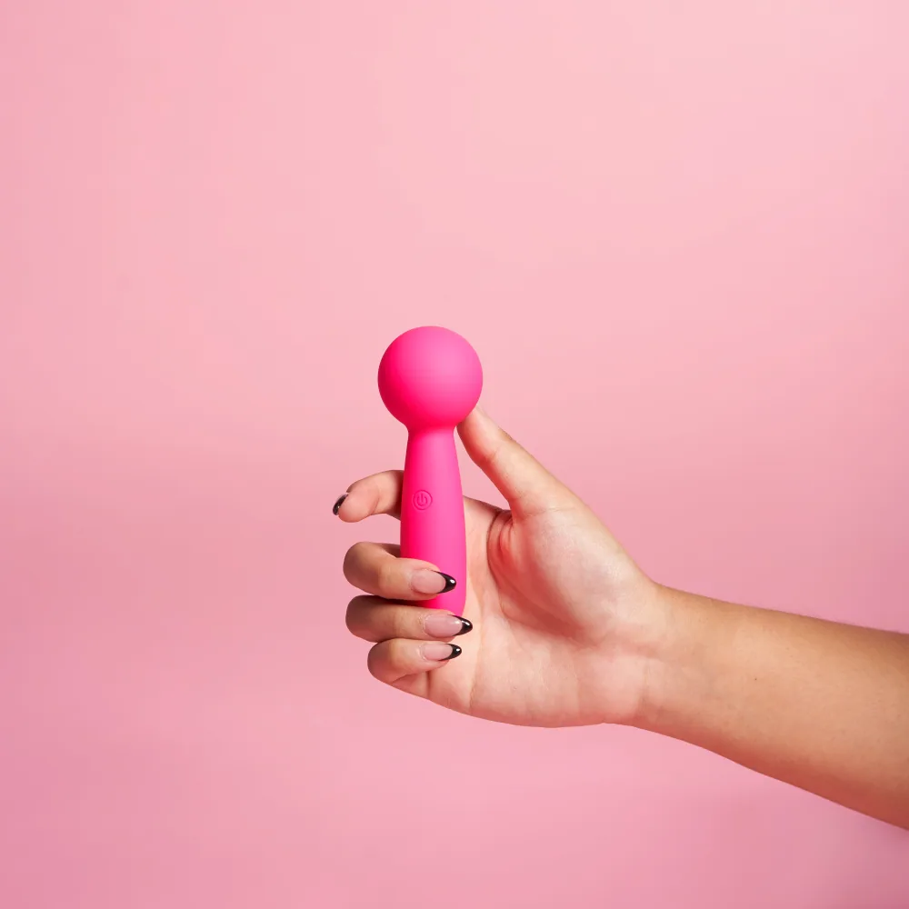 Lolly clitoral vibrator in hand