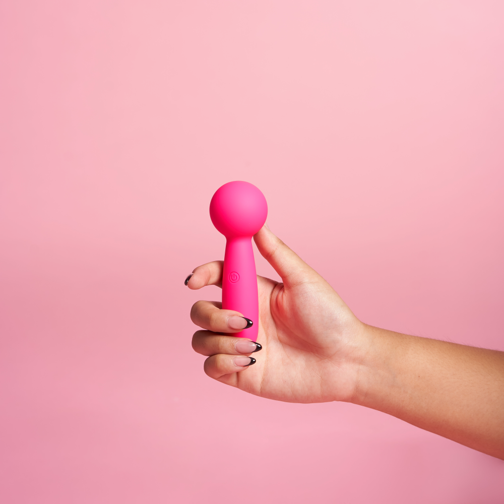 Lolly clitoral vibrator in hand